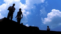 Silhouettes of Habitat for Humanity workers